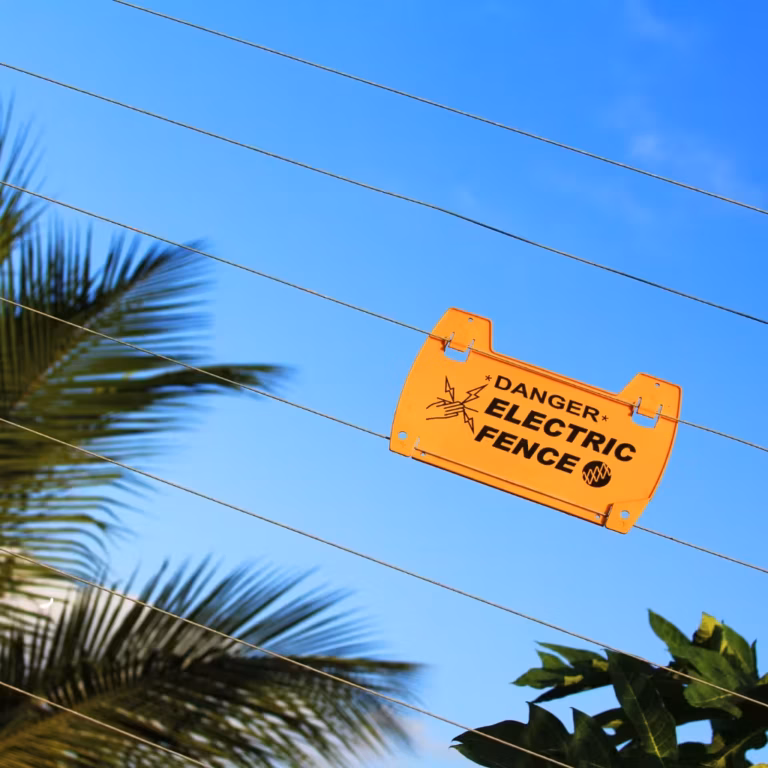 Electric fence installers Johannesburg warning sign with Nemtek technology by Intelligence VIP Protection Services.