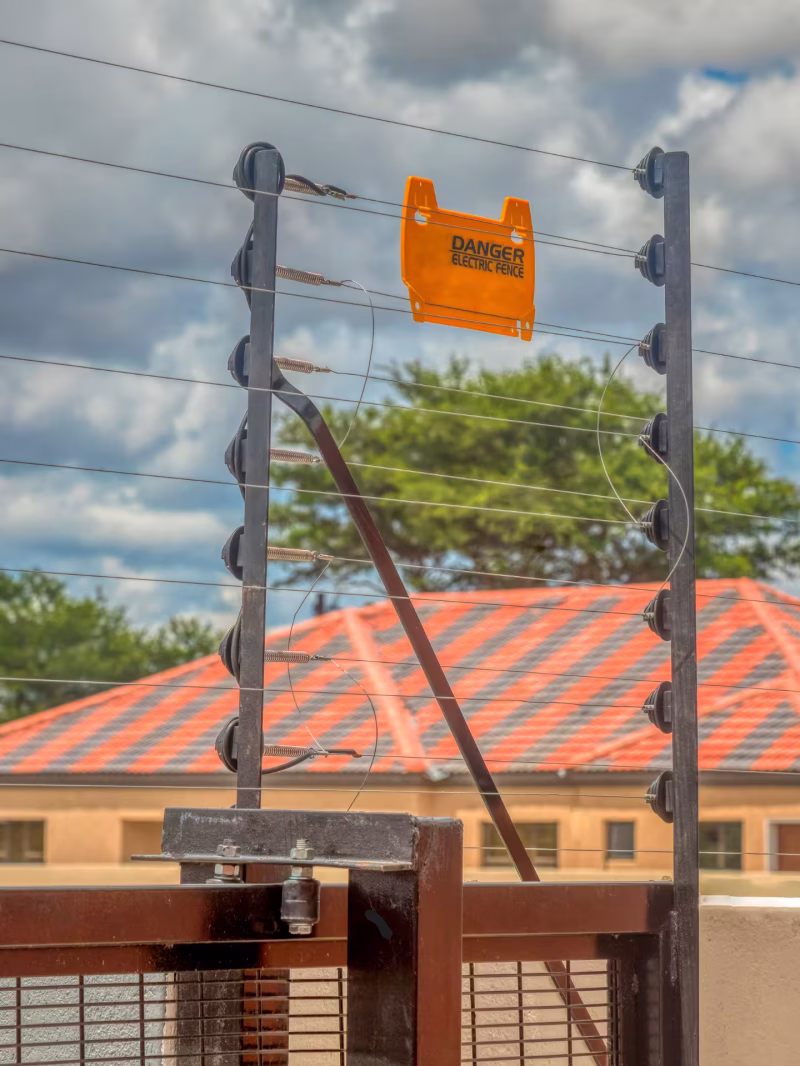 Electric fence installation for residential, commercial, and industrial security by Intelligence VIP Protection Services.